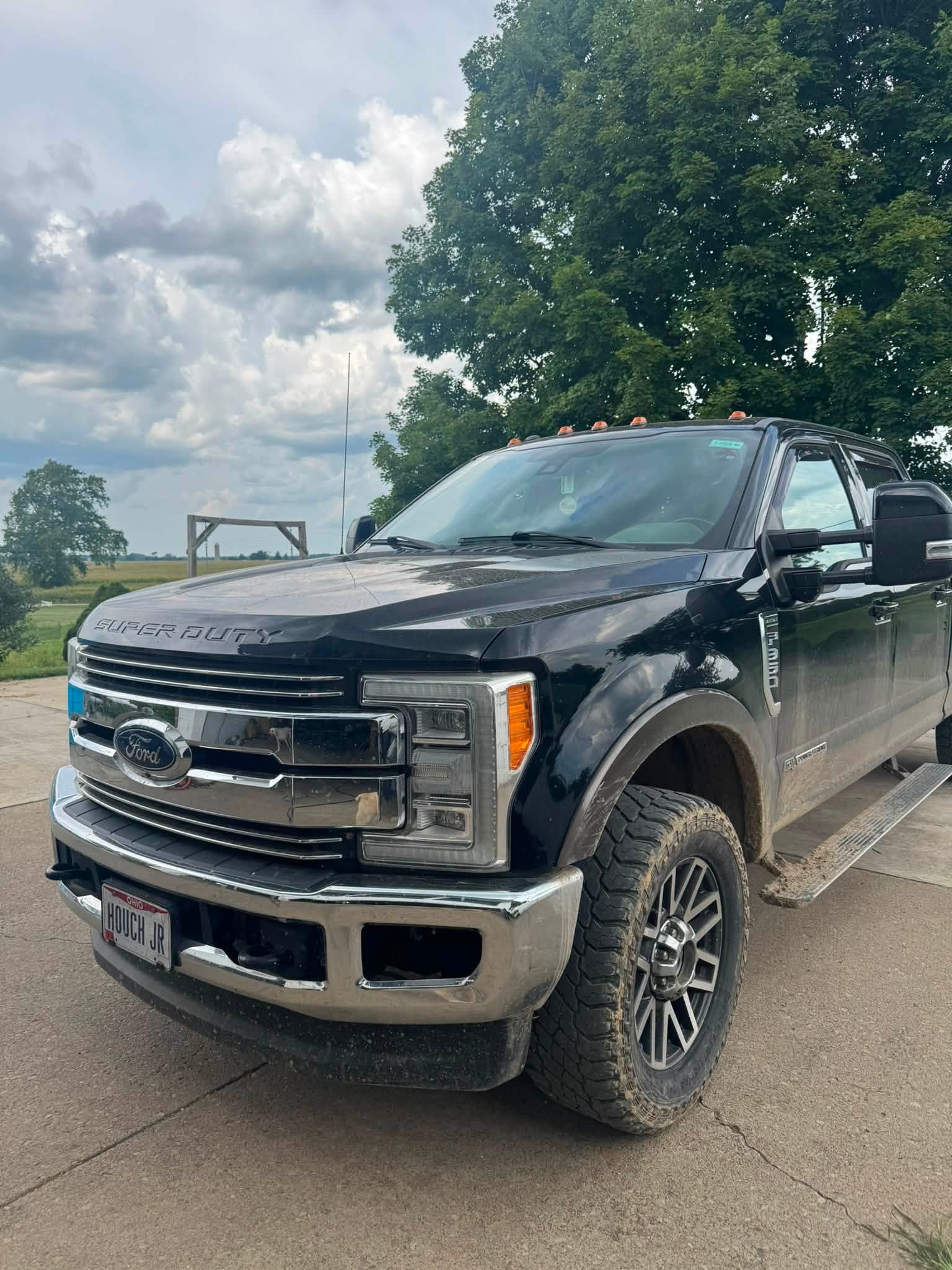Black Ford F-250 gleaming after a platinum detail and exterior wash at Blackwater Auto Garage