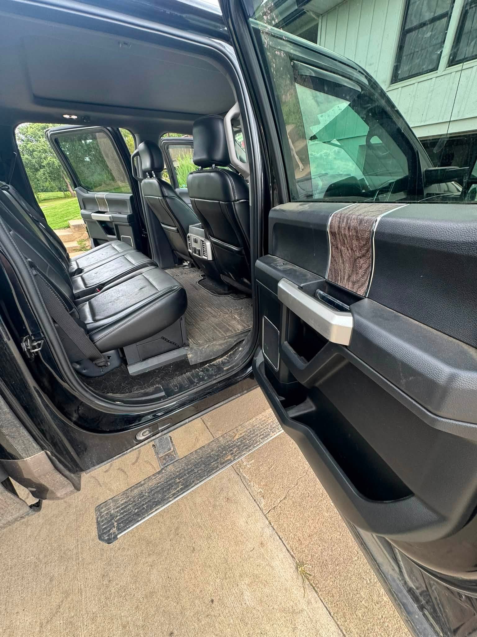Spotless truck interior with clean leather seats and floor